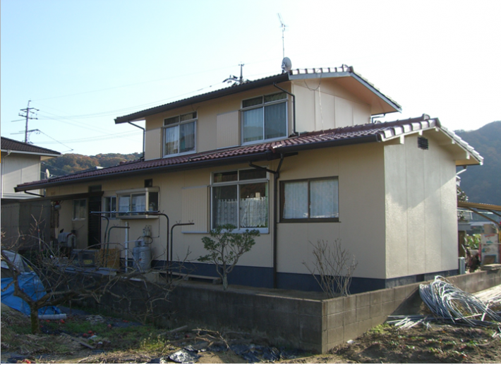 勝手口側から見た施工完了の岡山市北区Y様邸の写真
